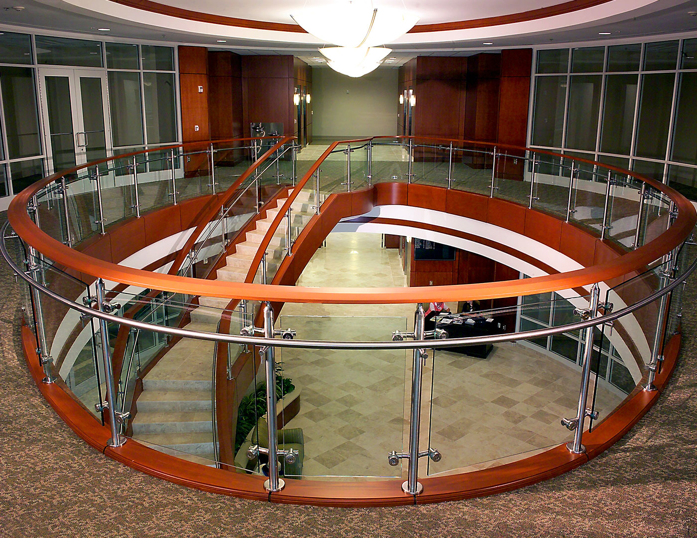 elegant double steel beam columbus circle curved Staircases with timber steps
