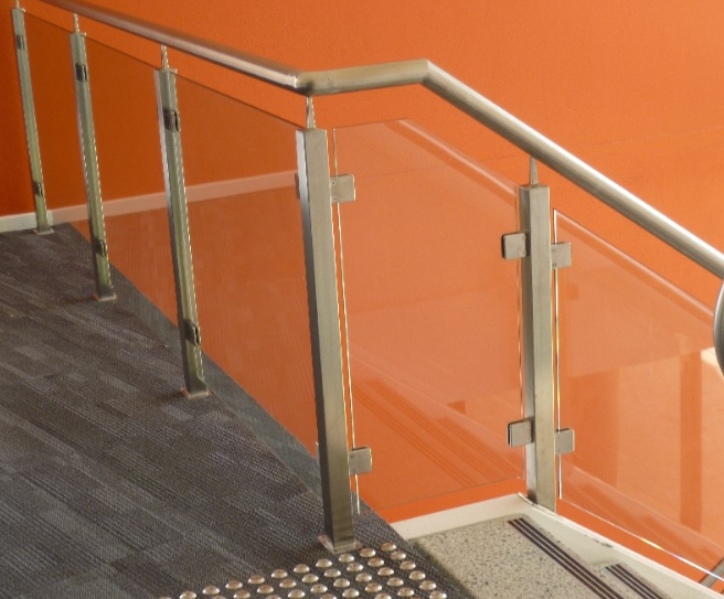 Square post glass railings with round handrail 