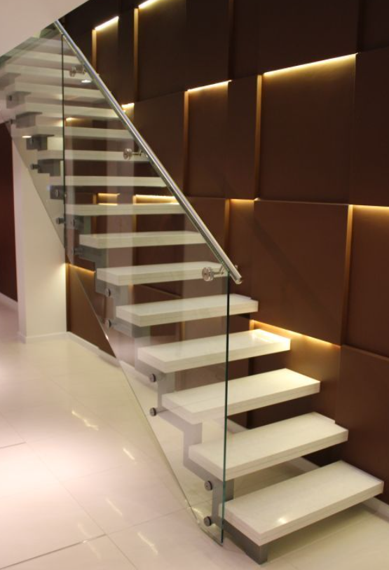 marble tread floating stair with glass railing