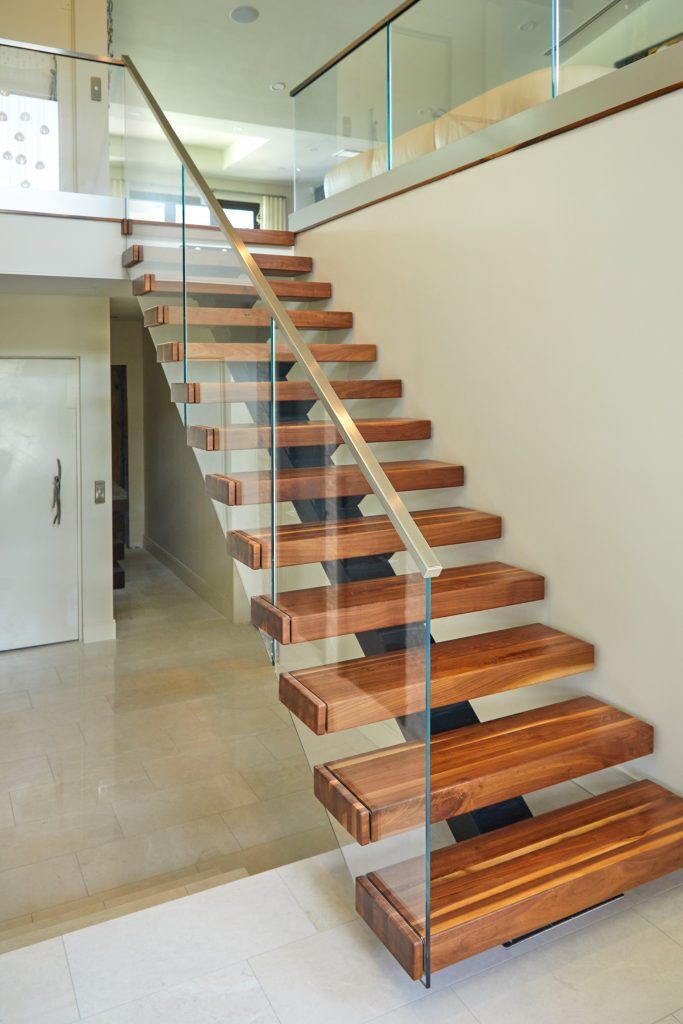 mono stringer straight stair with wood tread glass railing
