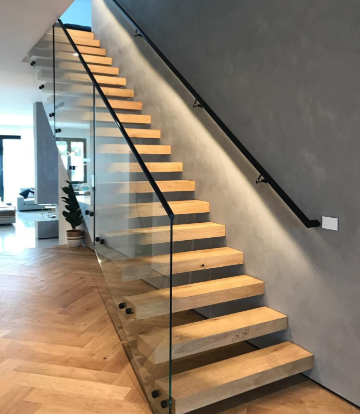 floating stair with wood tread and glass railing