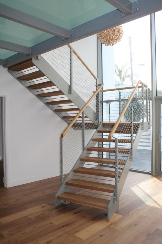 half landing staircase with wood tread